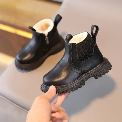 Bota de nieve para niños de piel. 