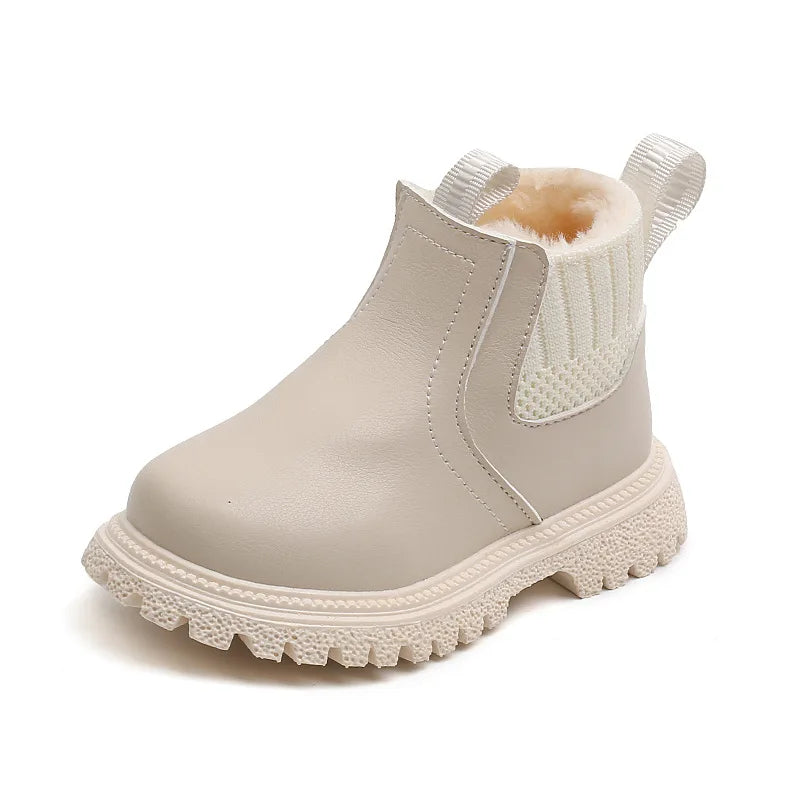 Bota de nieve para niños de piel. 