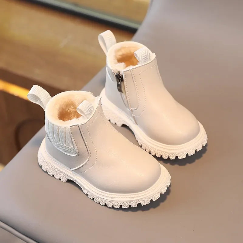 Bota de nieve para niños de piel. 