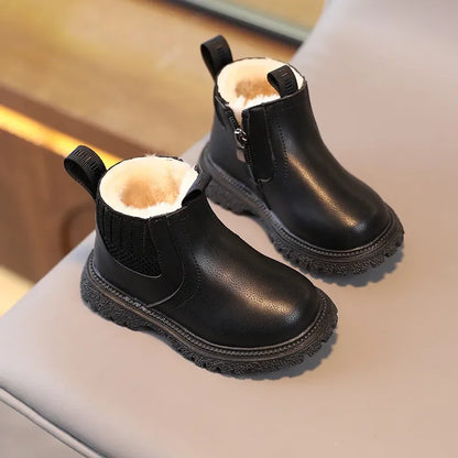 Bota de nieve para niños de piel. 