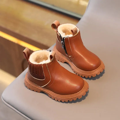 Bota de nieve para niños de piel. 